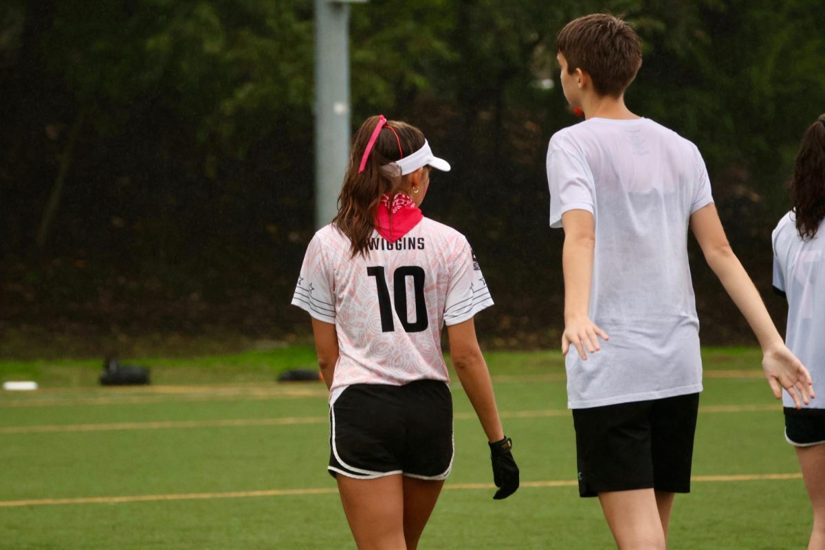 Elise Wiggins ('26) and Aster Peterson ('28) at a game against ACC