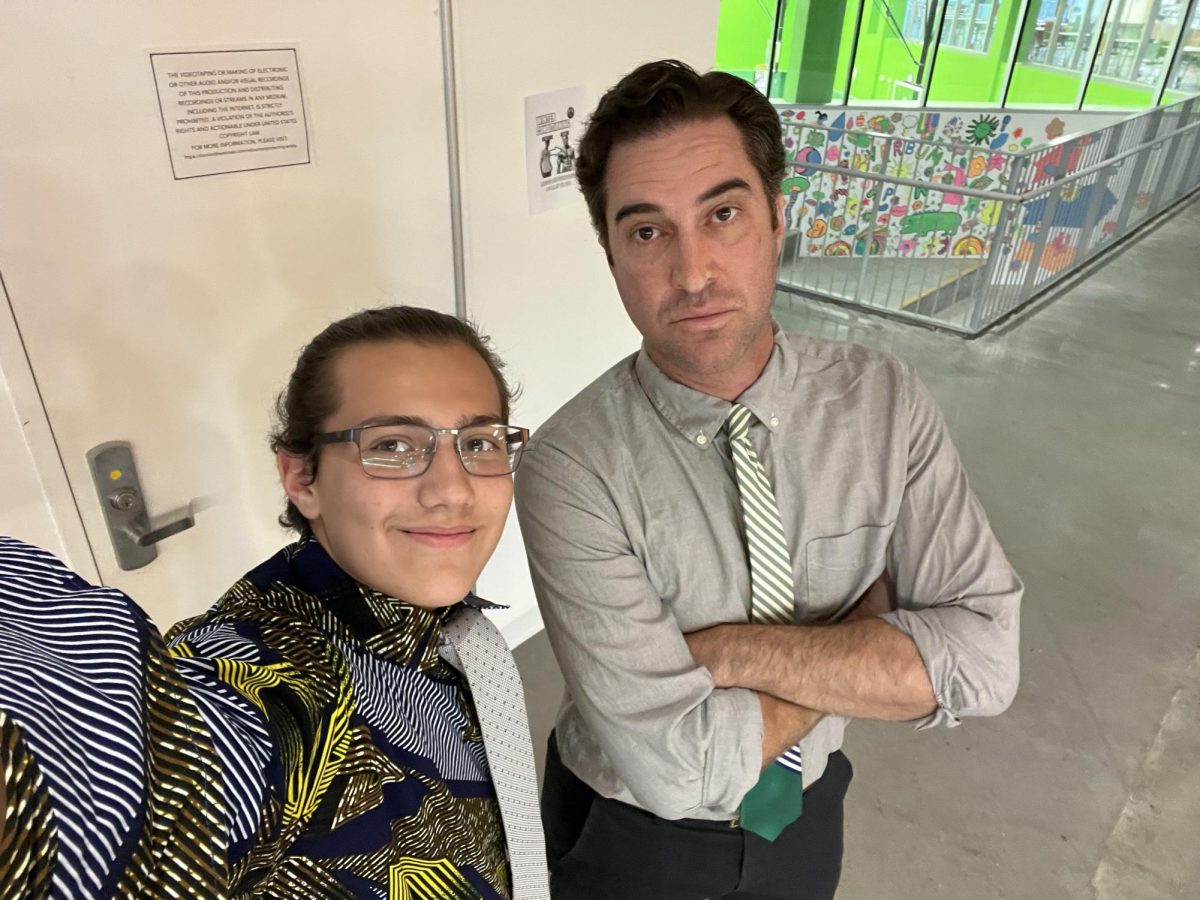 Graham, one of the originators of Tie Tuesday, with Arvand. 
