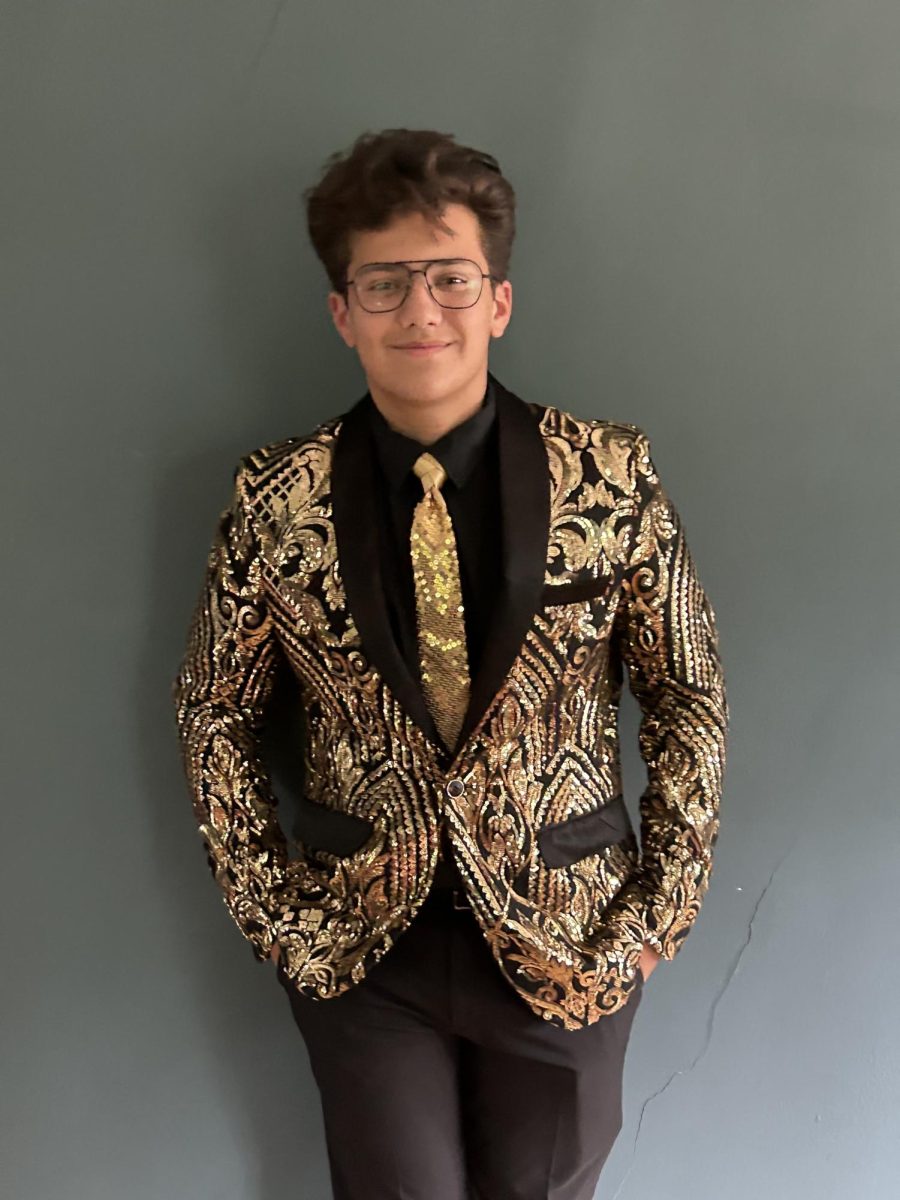 Arvand Fiske on his final Tie Tuesday of the year. 